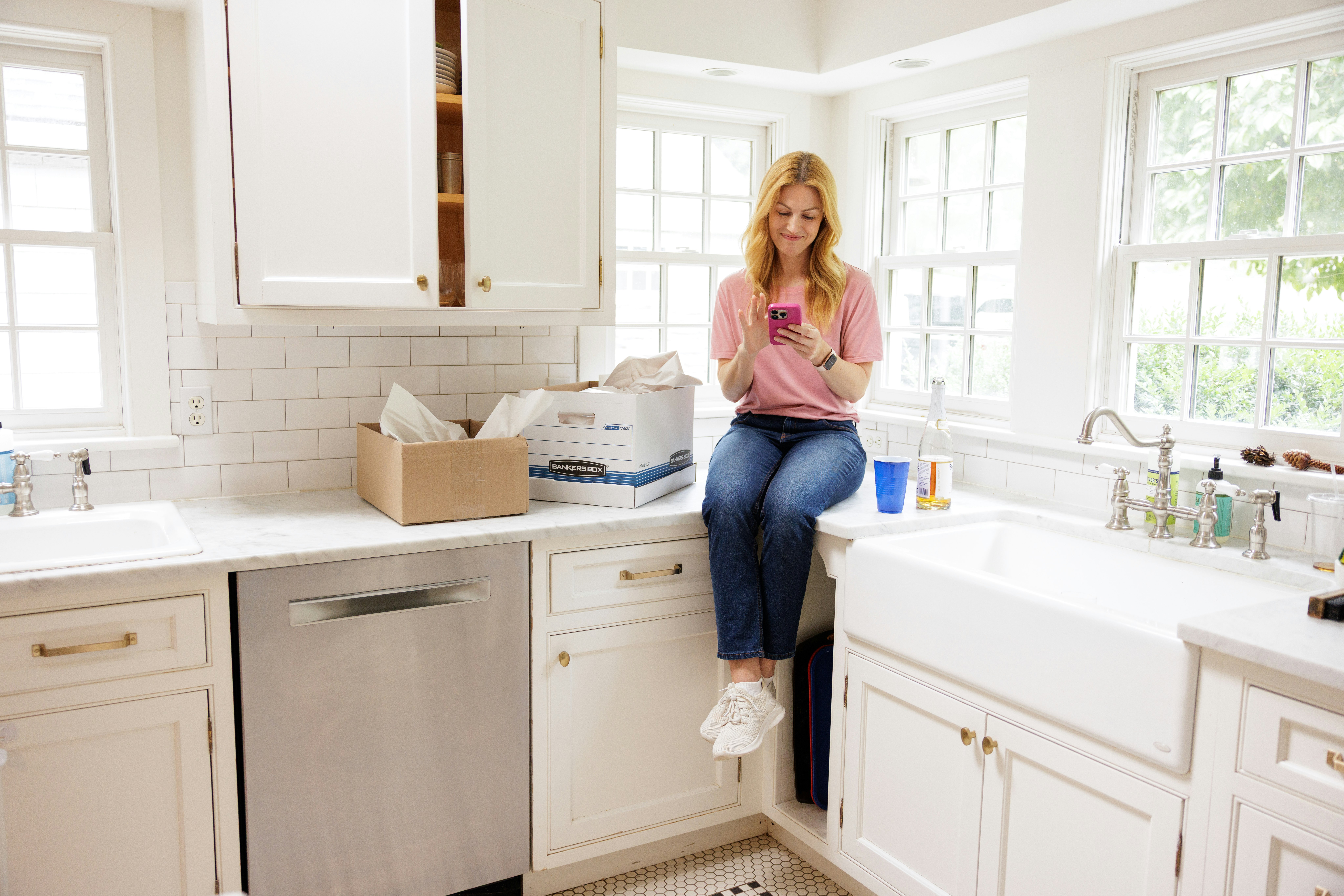 Young woman on counter in her home.