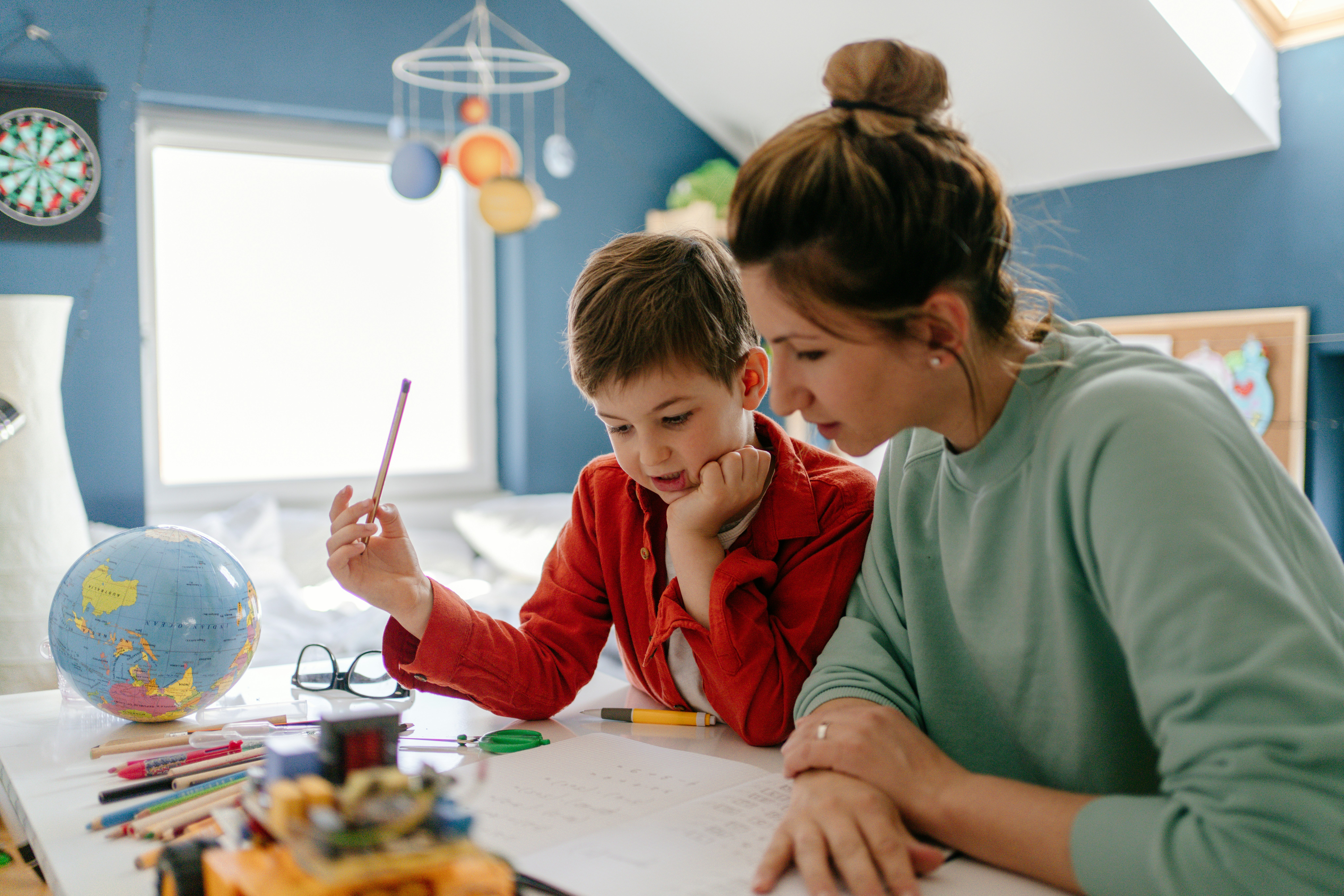 Mom and son doing homework