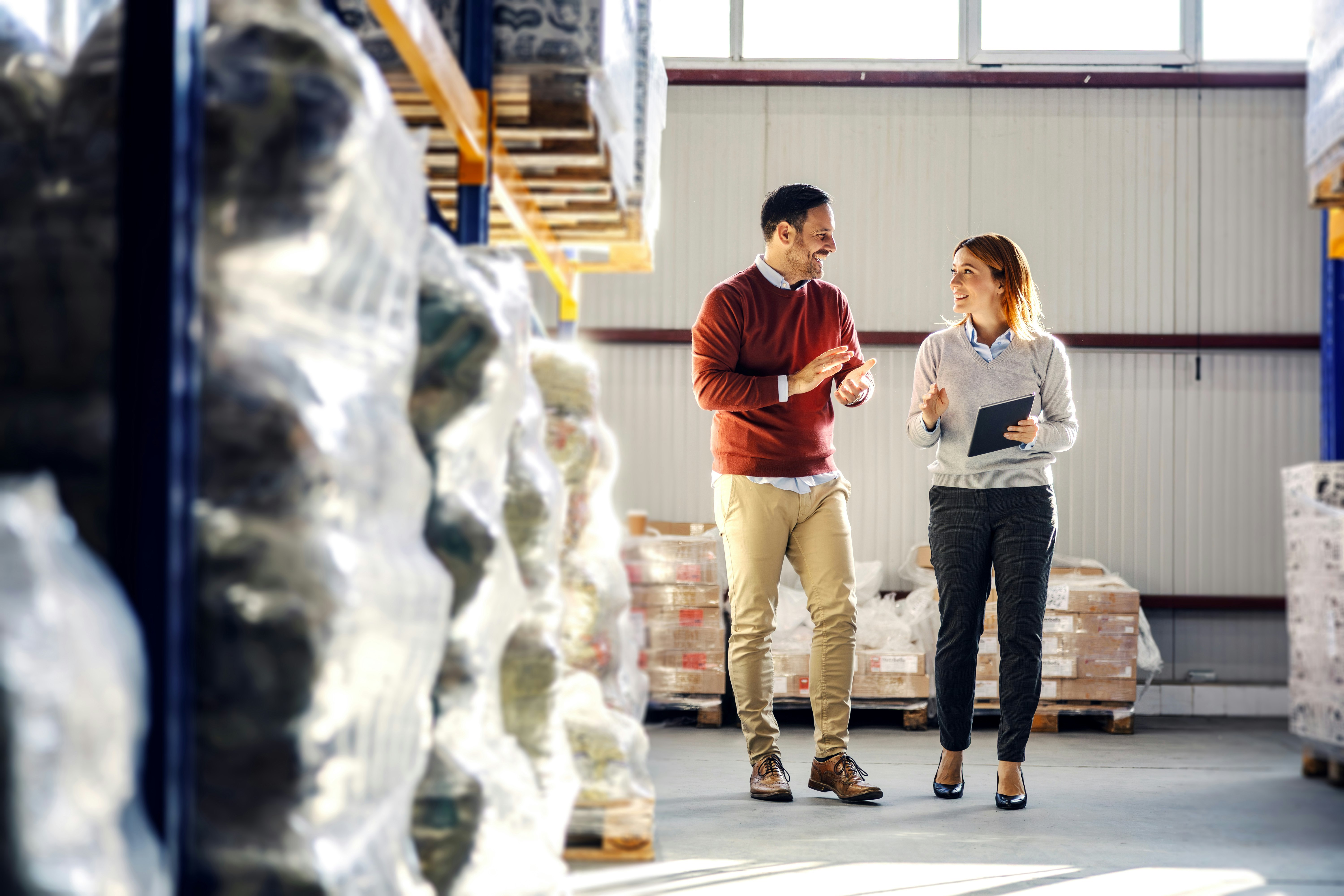 two people in a business warehouse