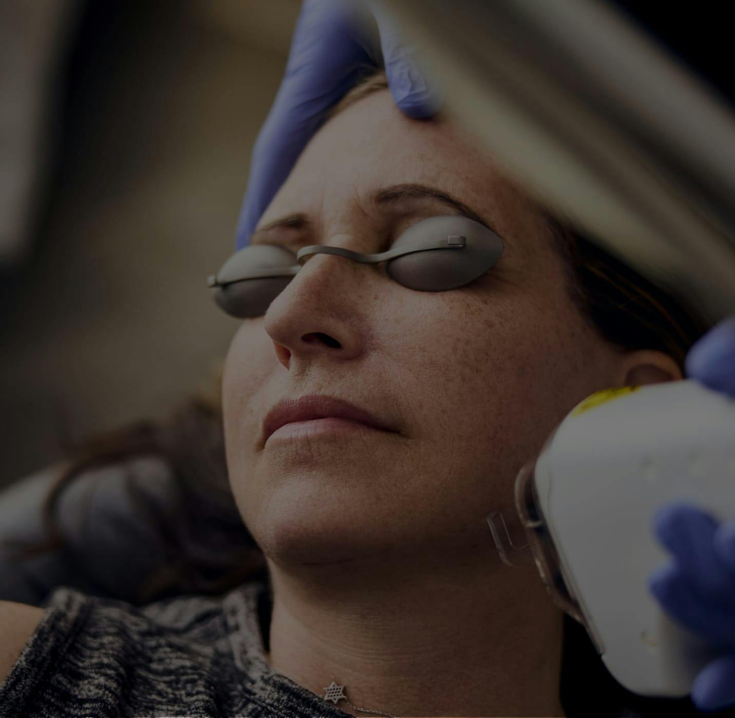 patient with eye protective covers on