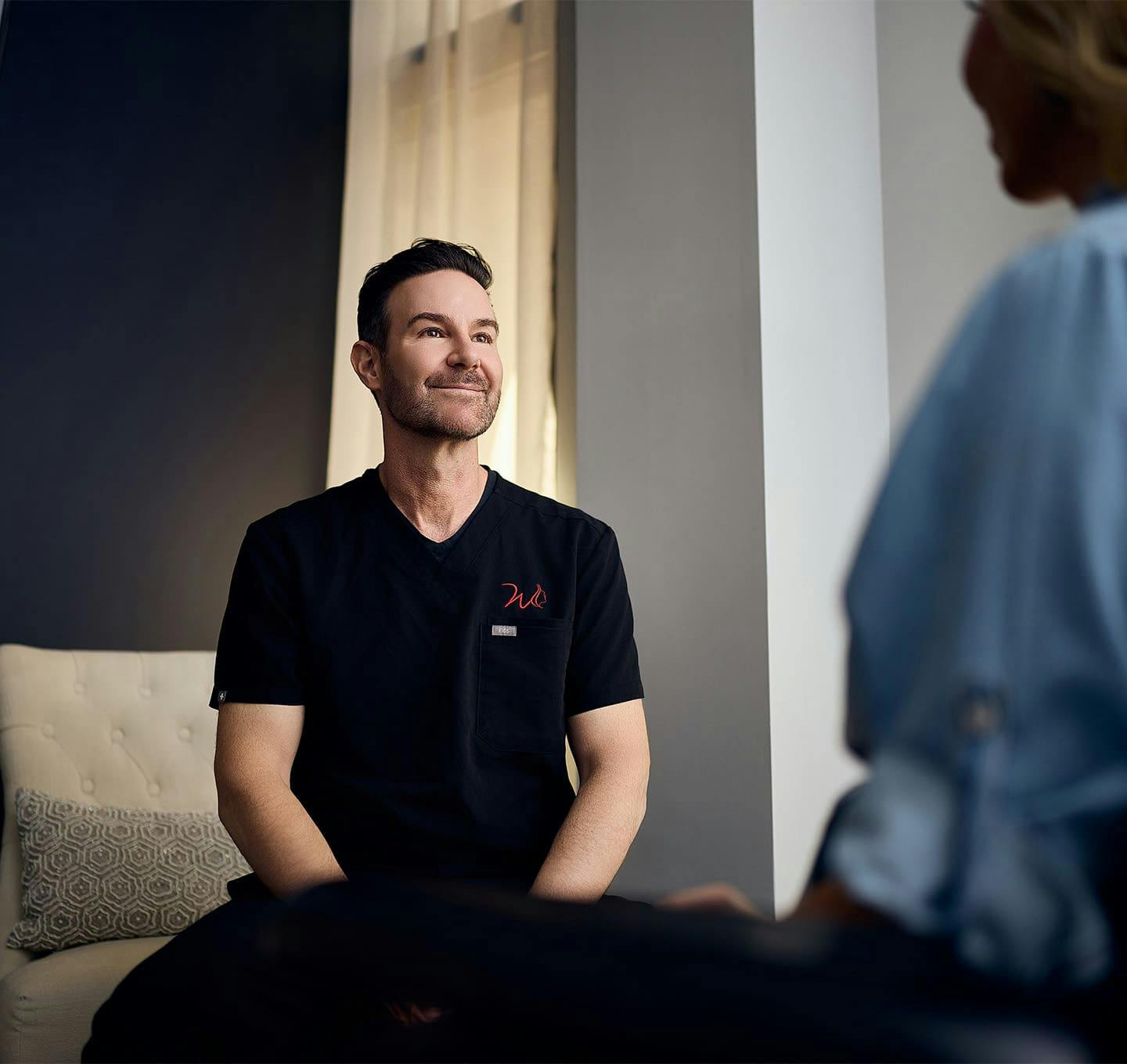 Doctor smiling during consultation