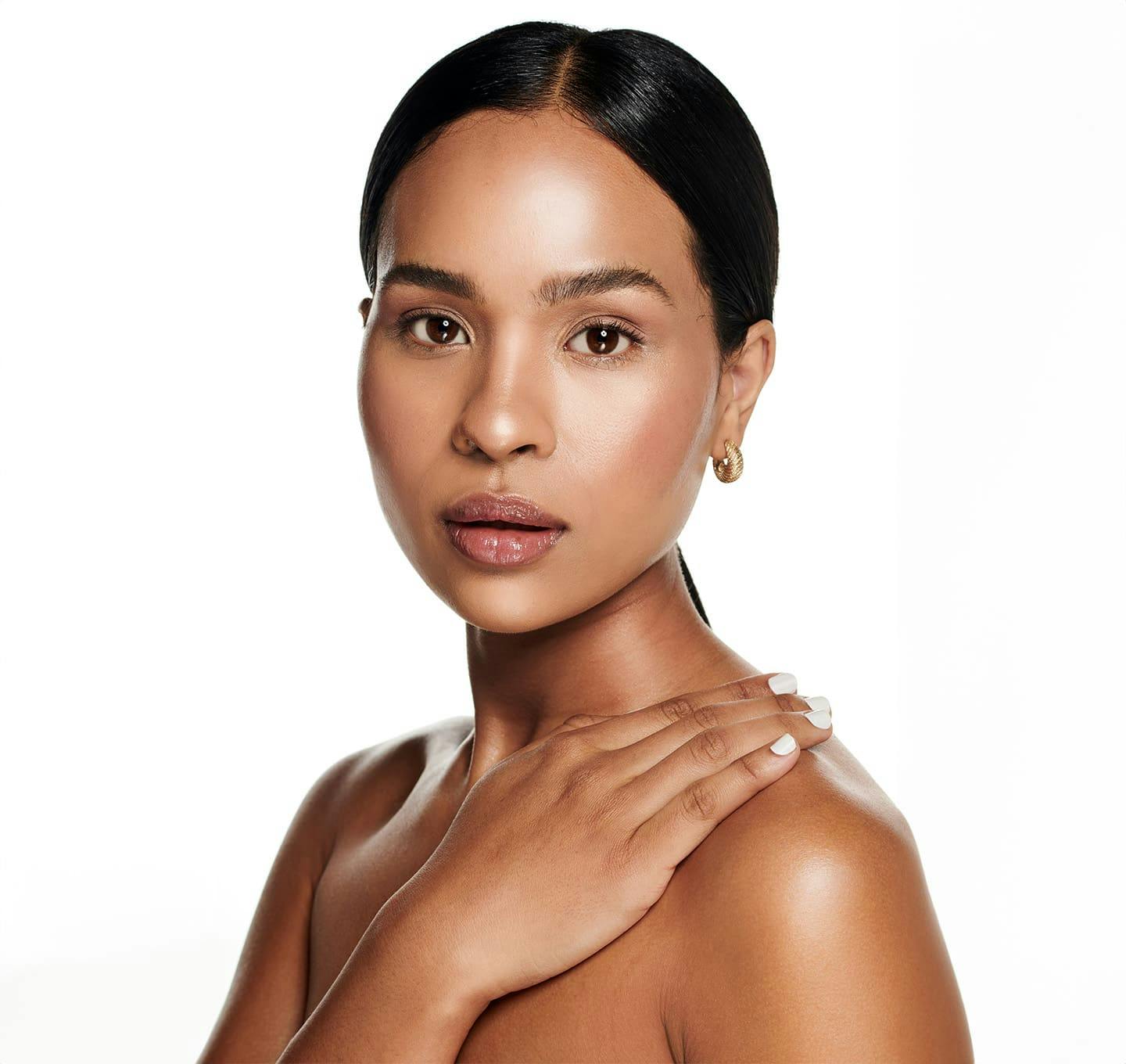 Woman touching chest