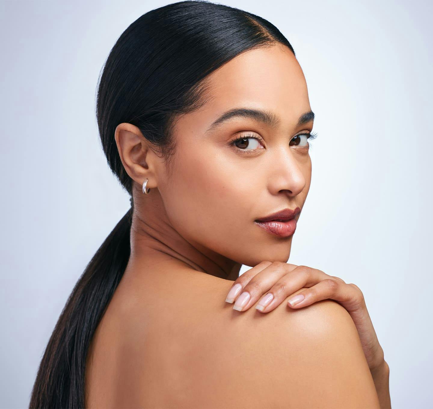 Woman looking over shoulder