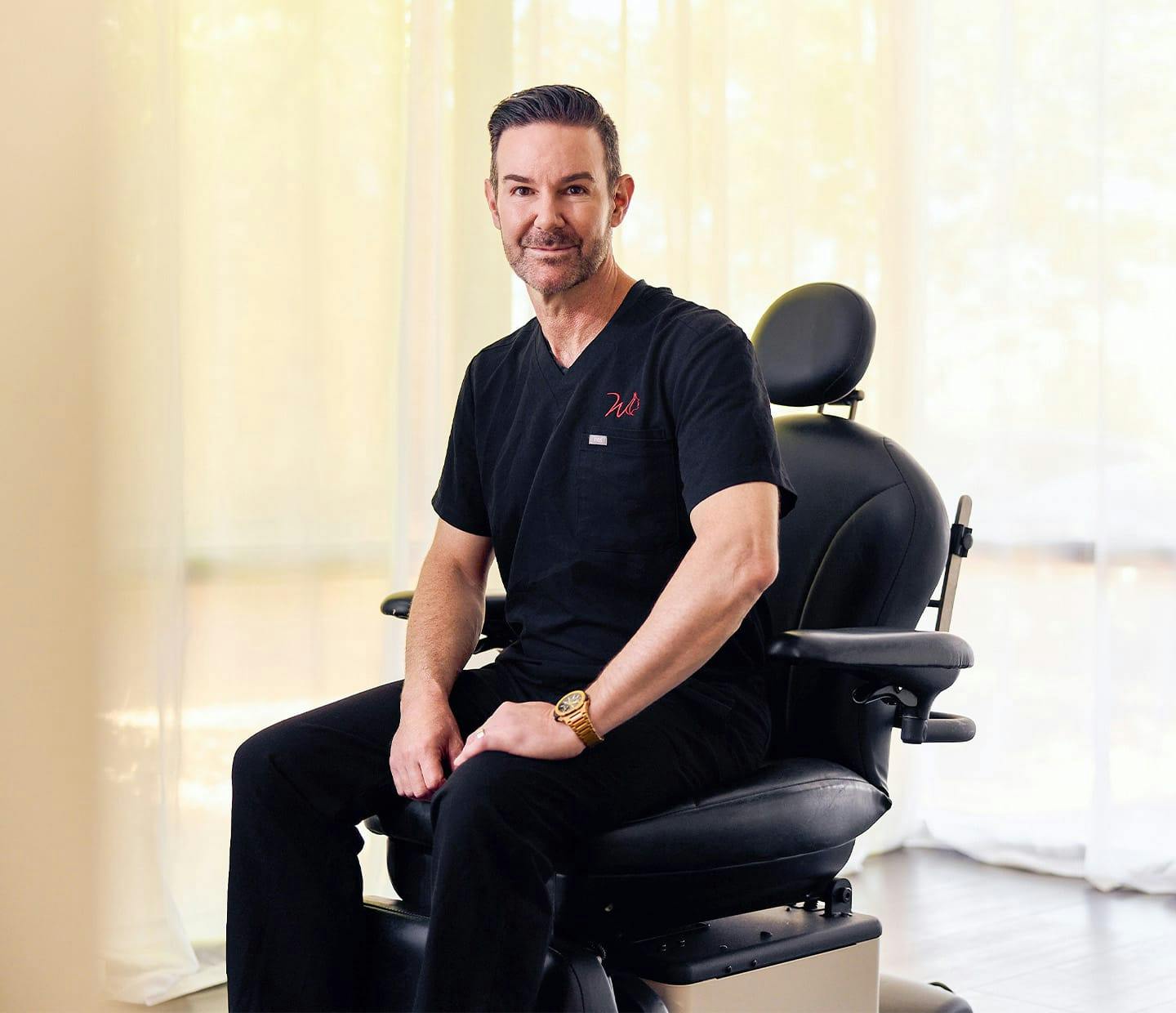 Doctor sitting and smiling