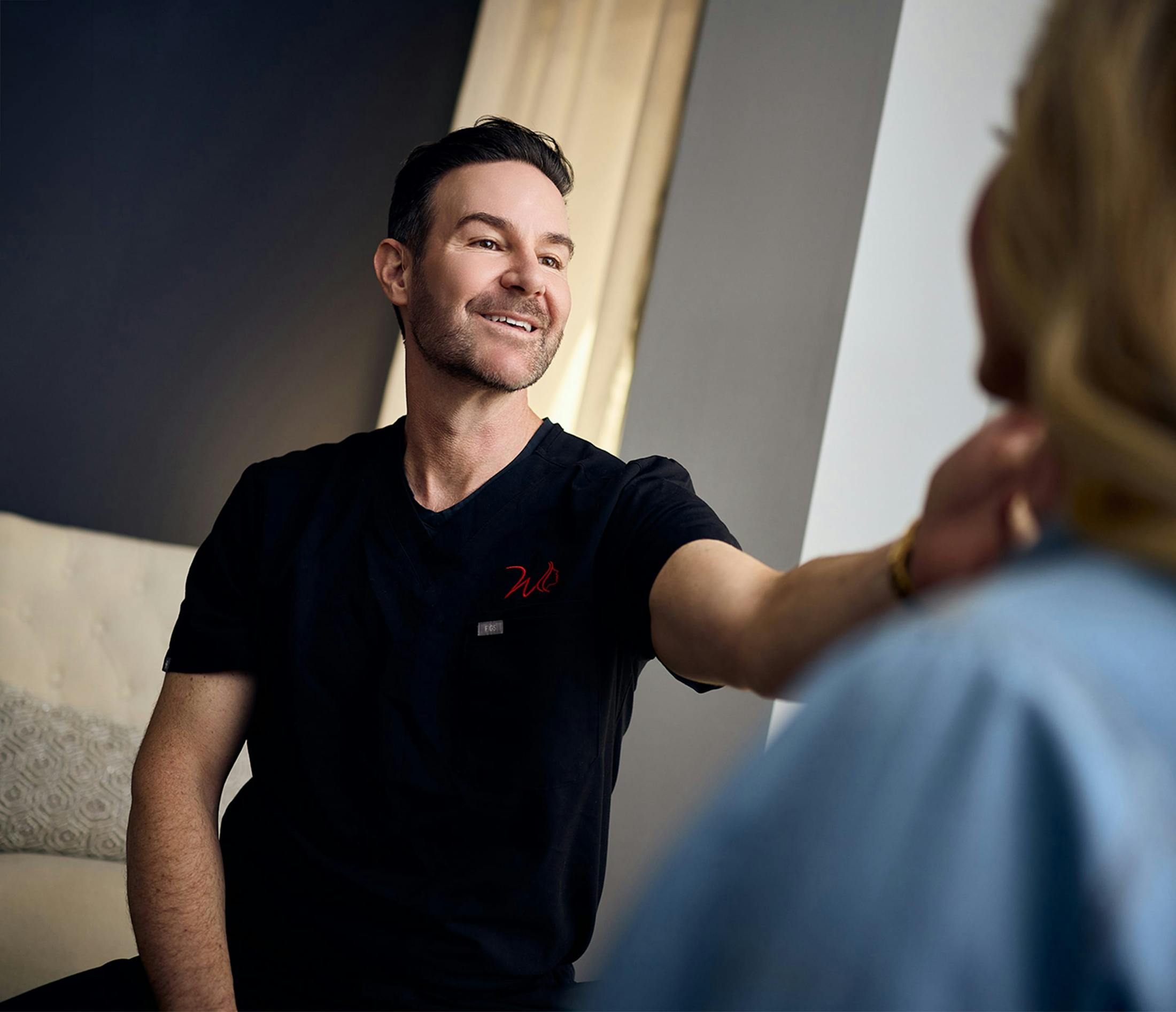 Doctor smiling during consultation