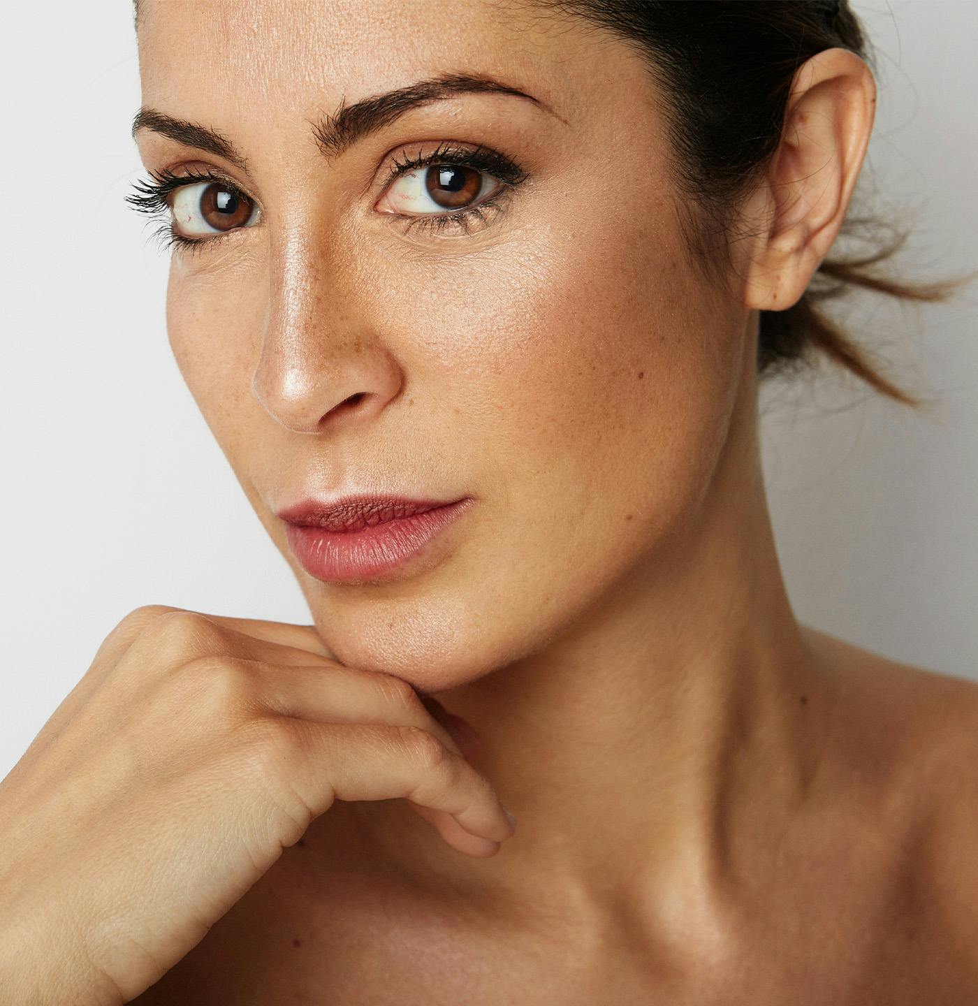 Woman touching her chin