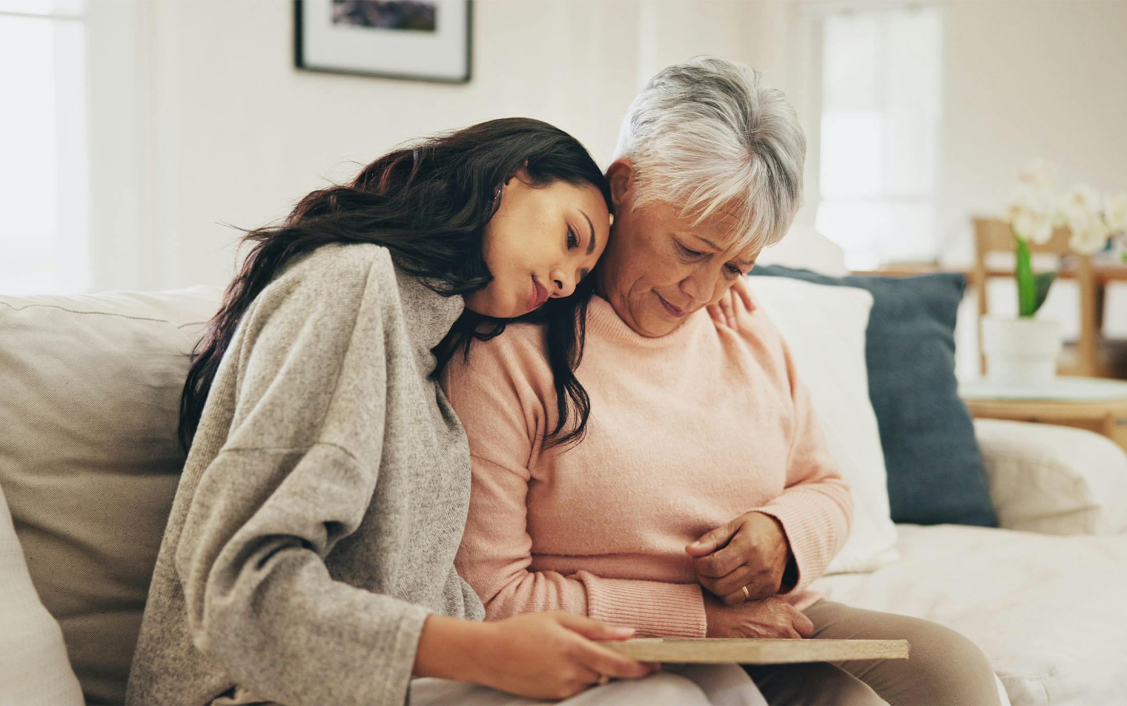 woman hugging an older woman
