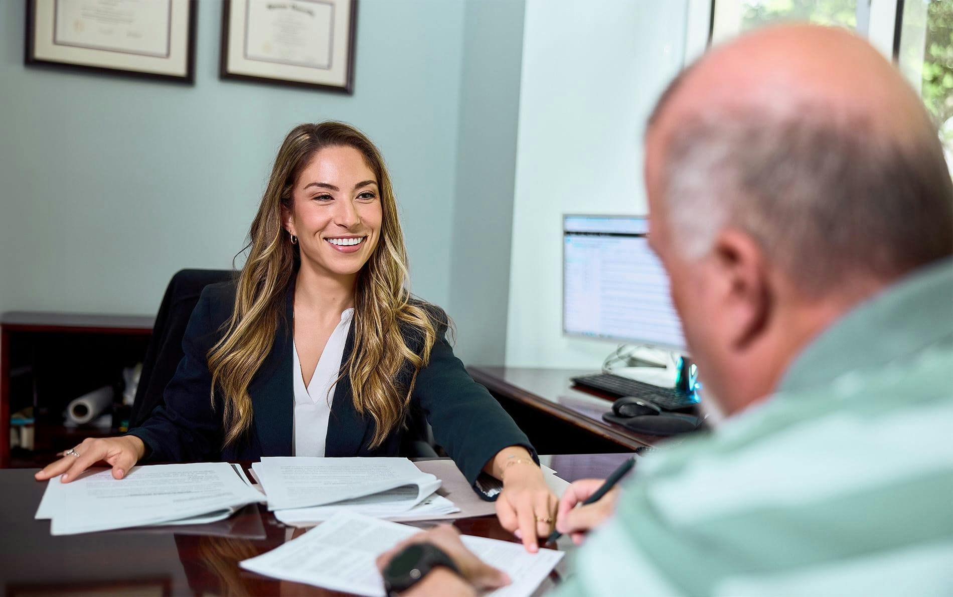 man filling out paperwork