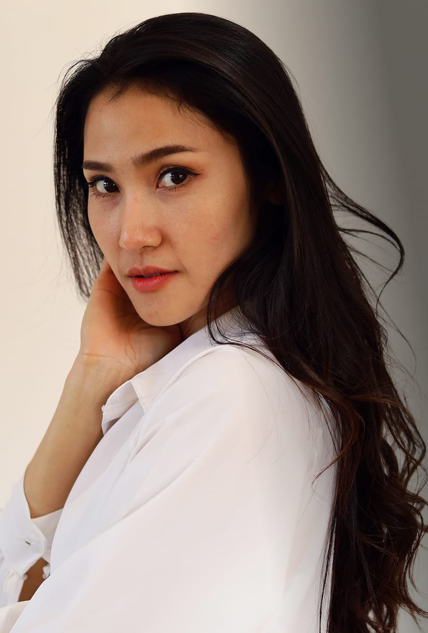 Woman looking over her shouilder