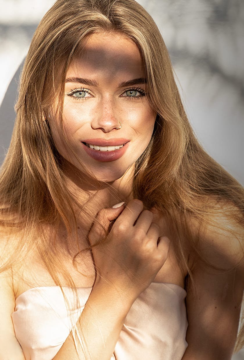 Blond woman in shadows