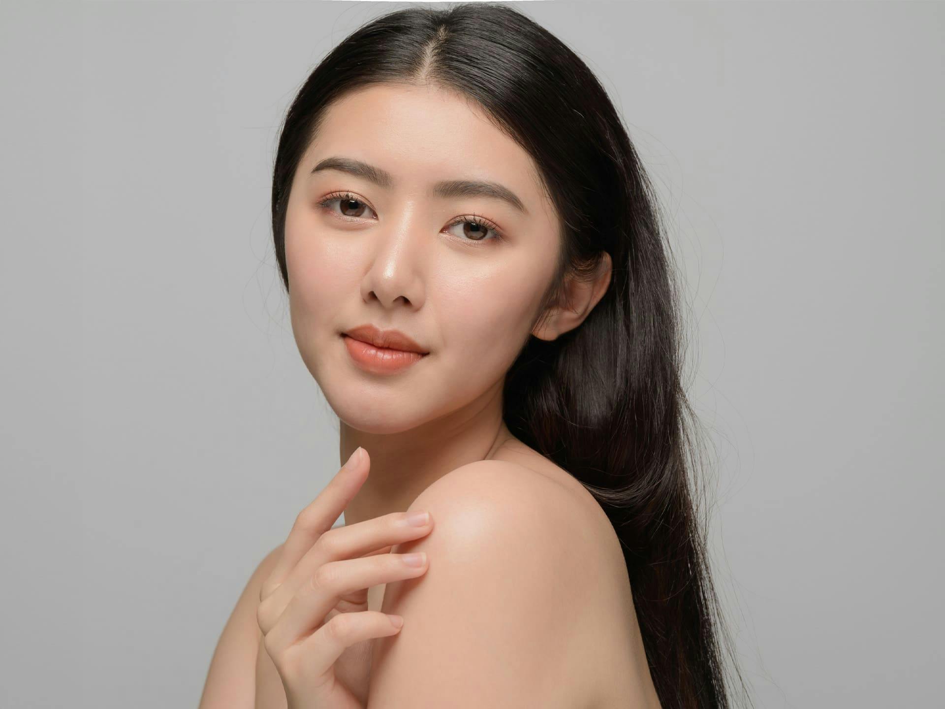 woman with her hand near her arm