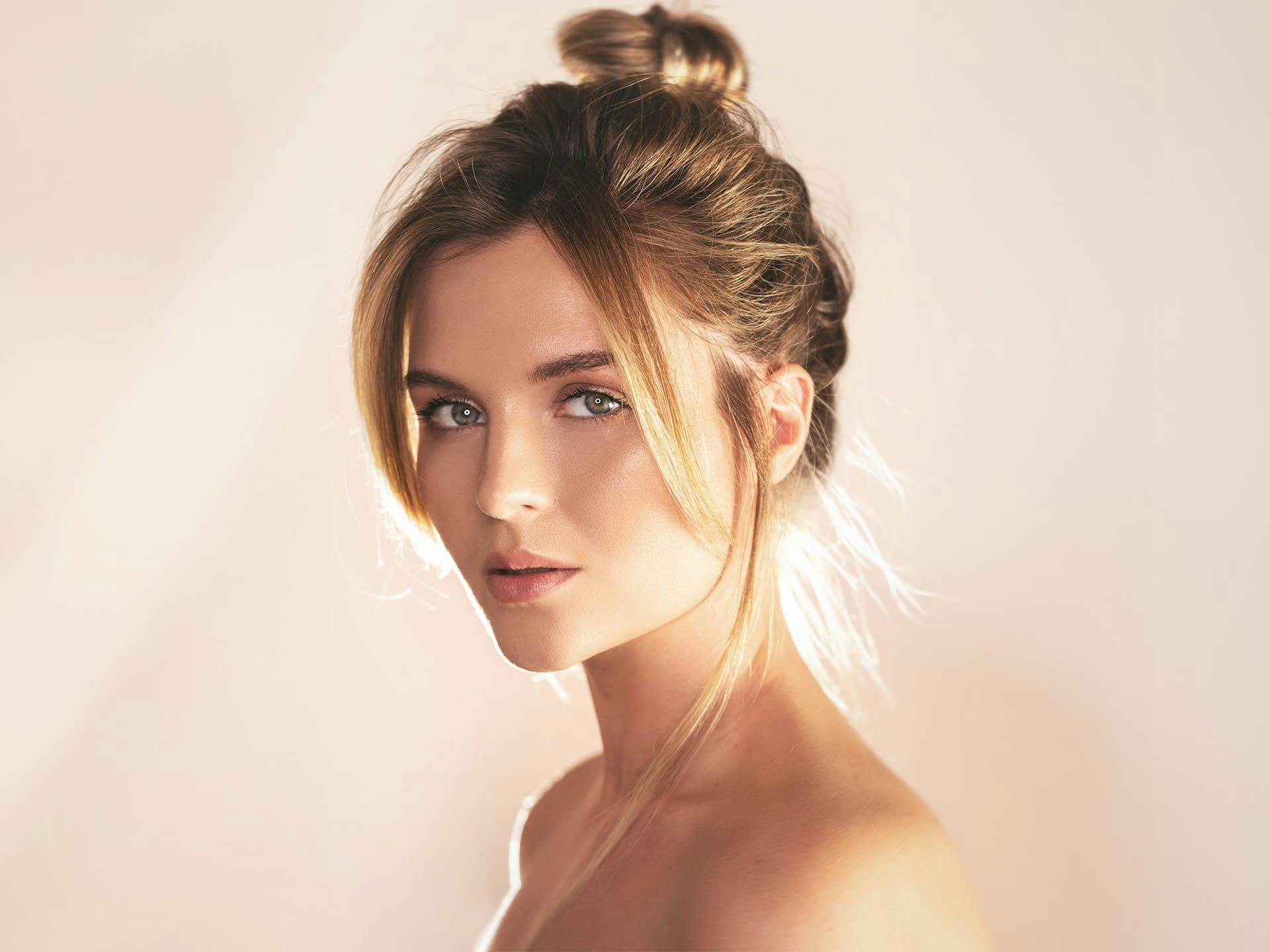 woman with a messy bun