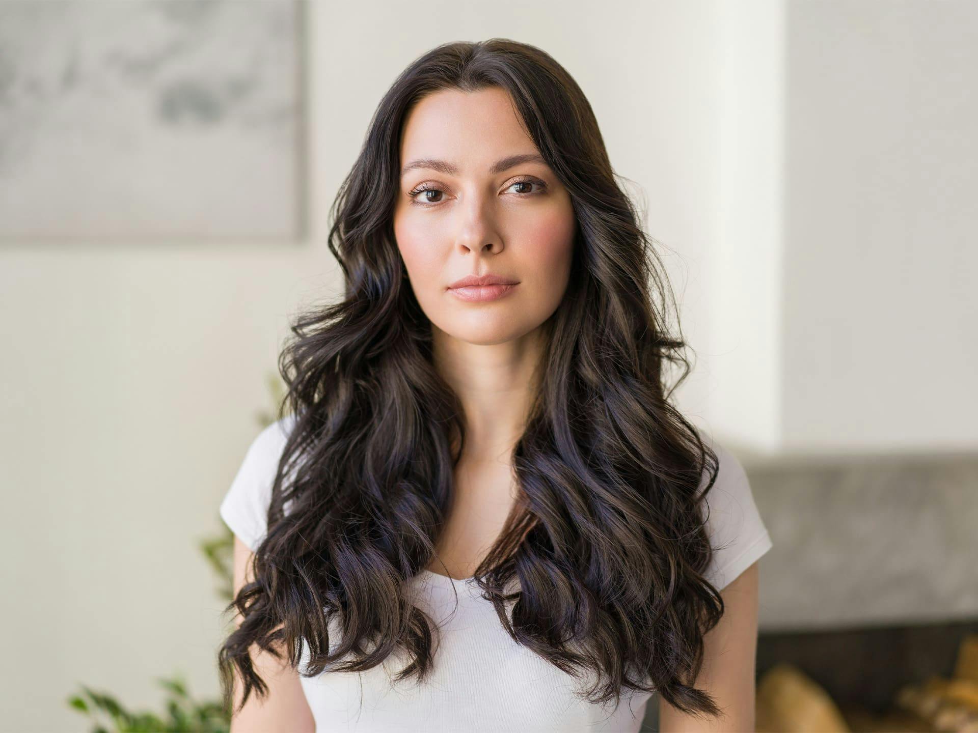 woman with long wavy brunette hair