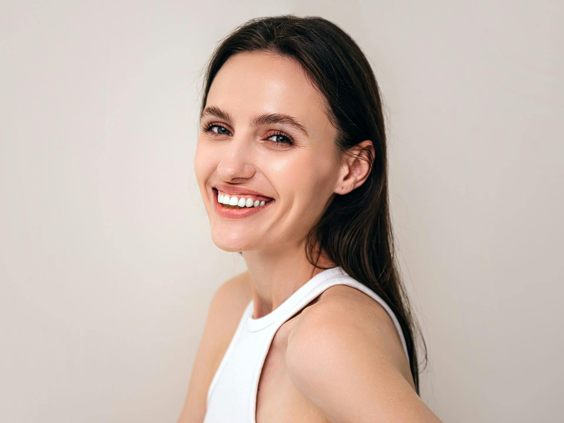 woman smiling with long black hair