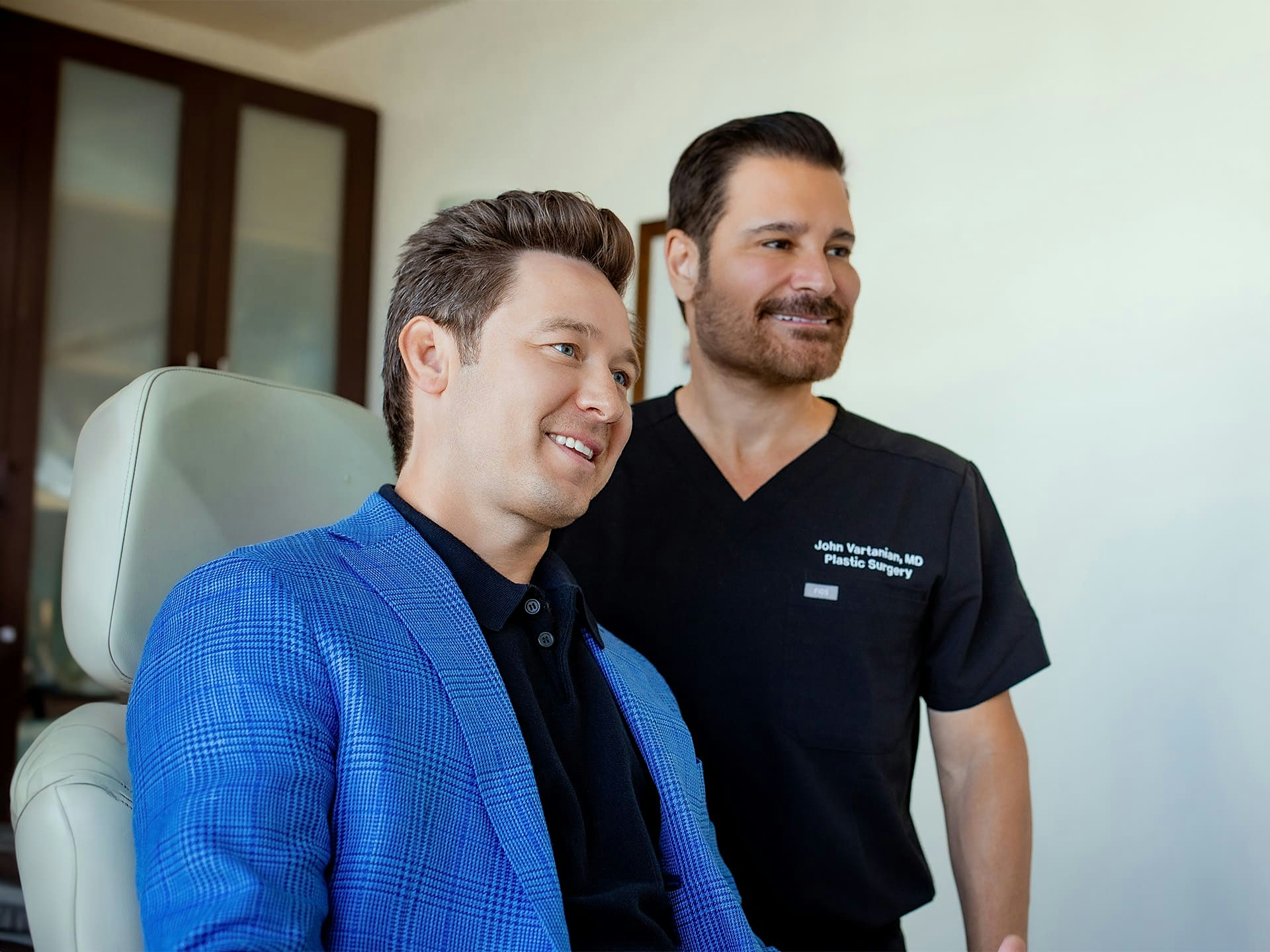 Dr. John Vartanian with male patient