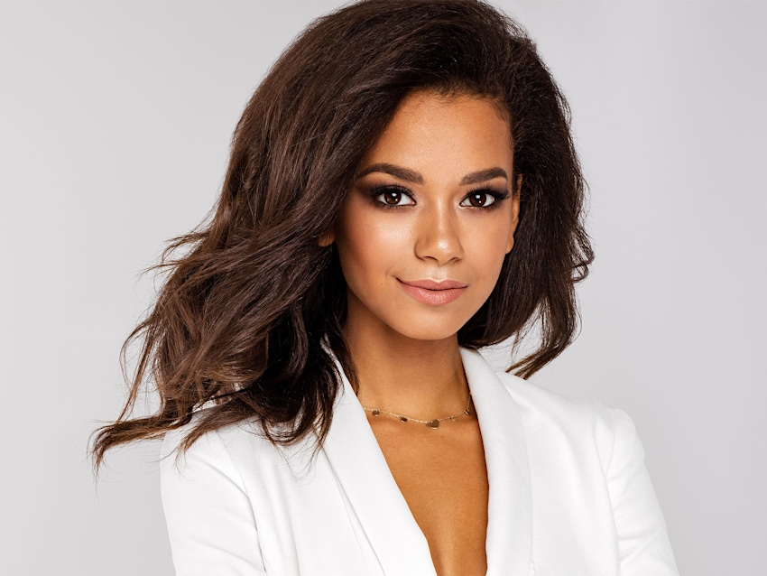 woman in white suit jacket