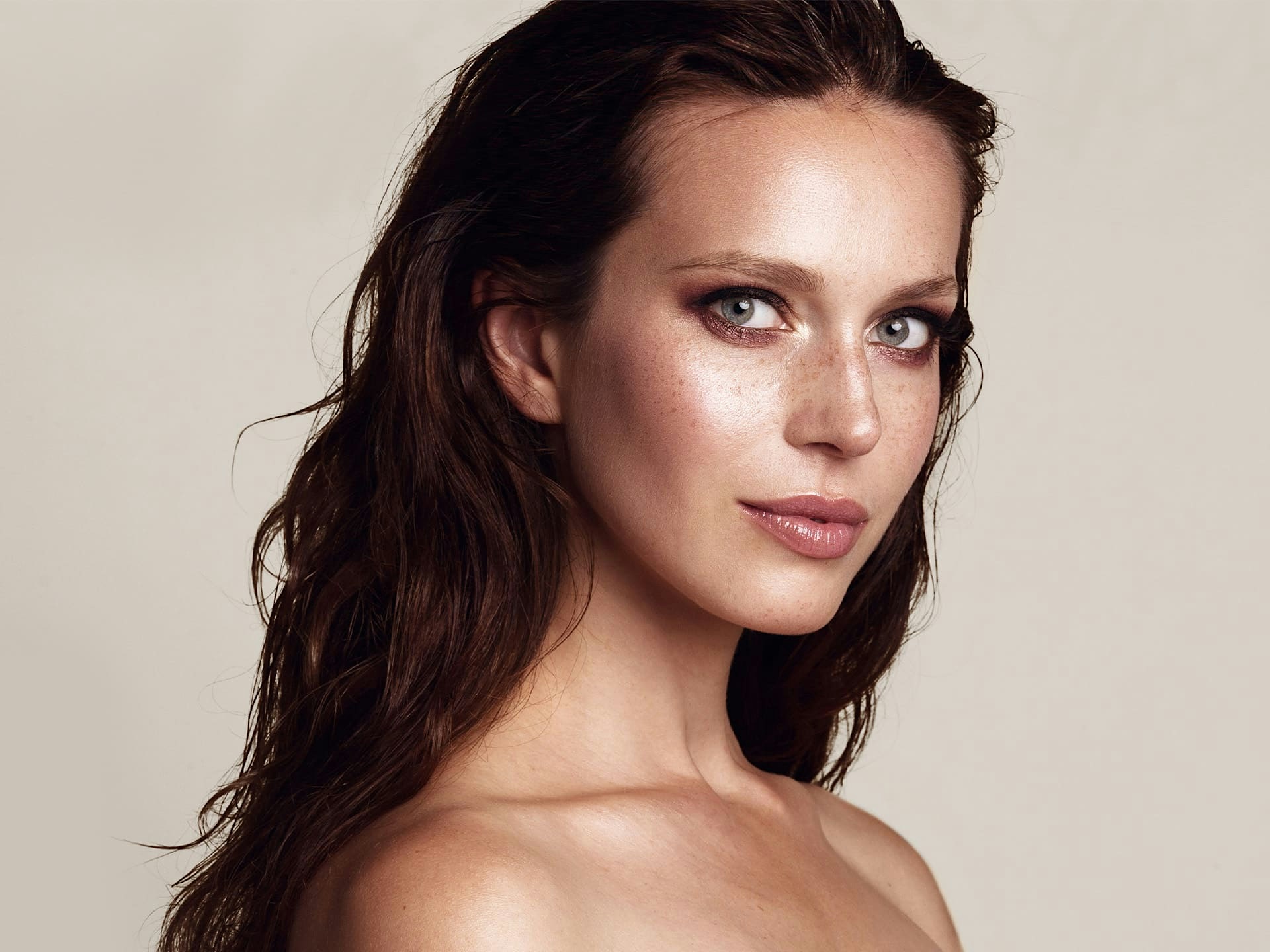 woman with her hair pushed back