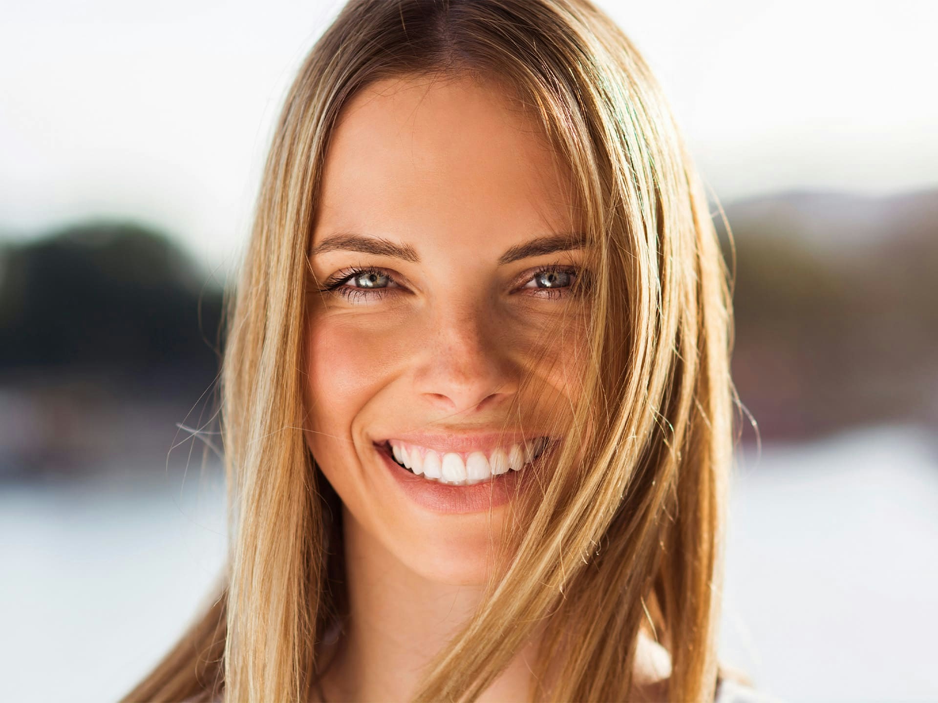 woman smiling forward