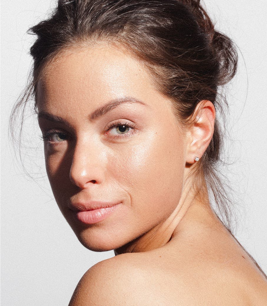 Woman looking over her shoulder