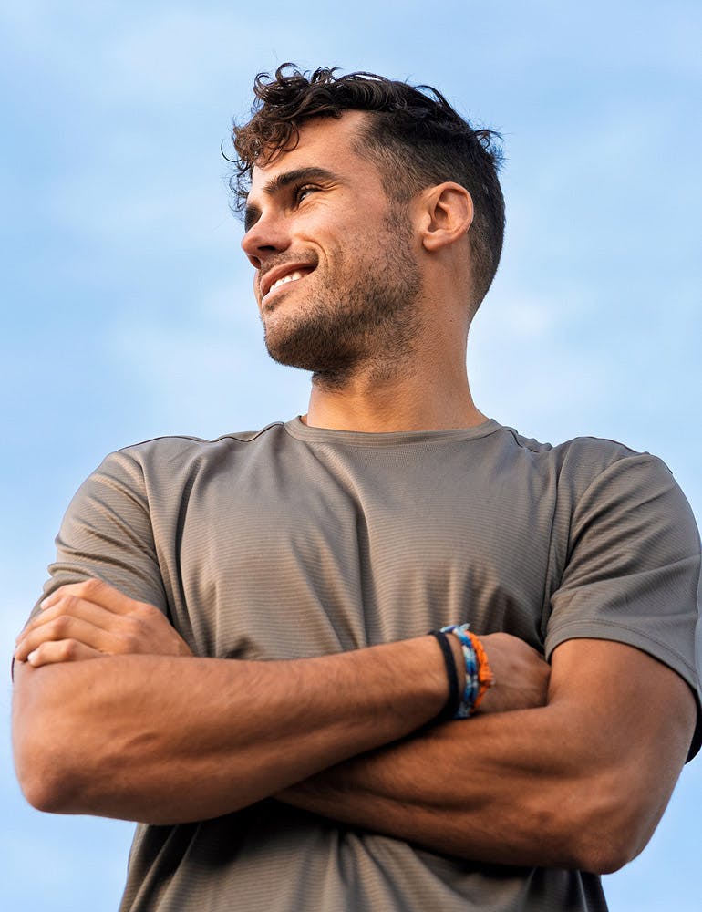 man crossing his arms