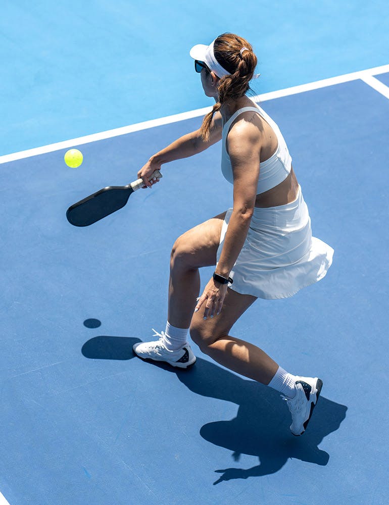 woman playing pickleball