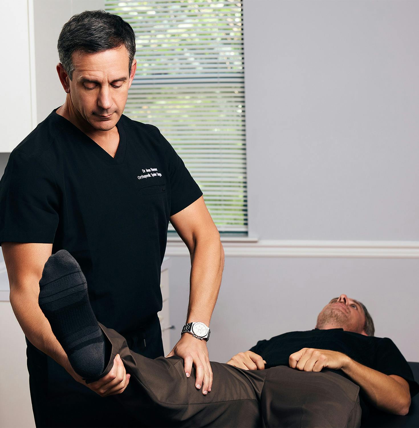 Dr. Krovner helping patient