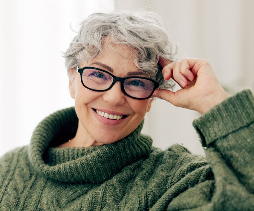 Woman smiling with glasses