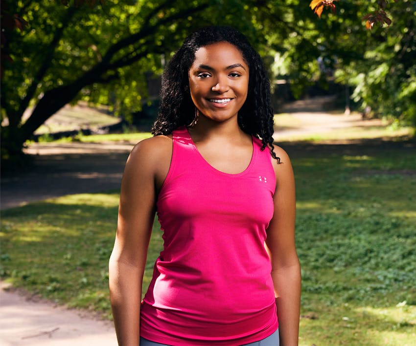 Woman standing and smiling