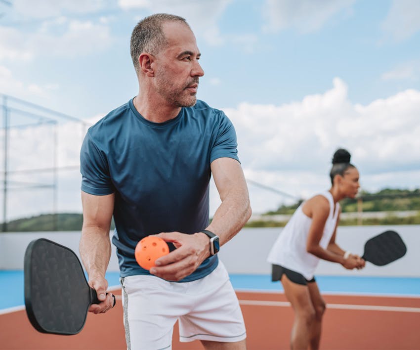 Man playing pickle ball