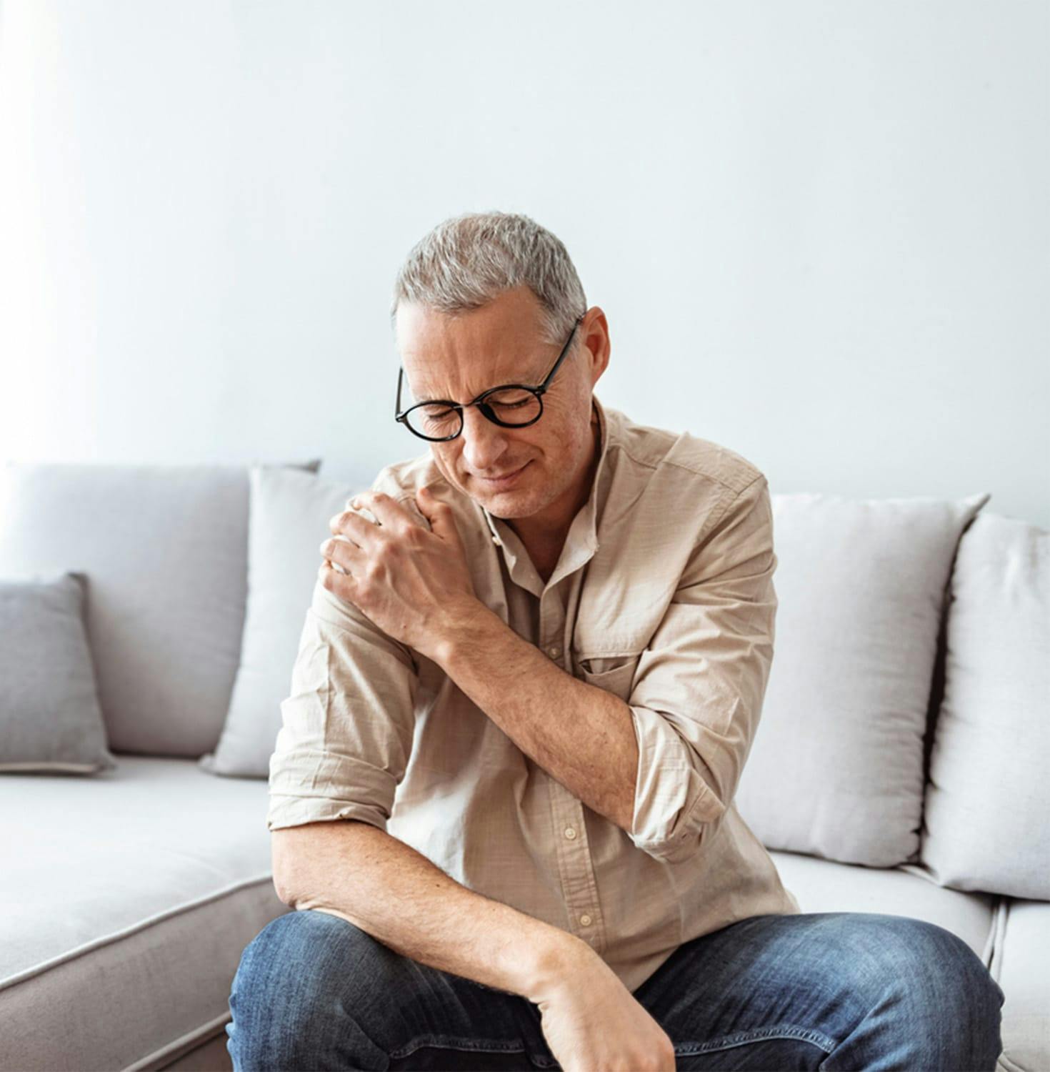 Woman smiling with arms crossed