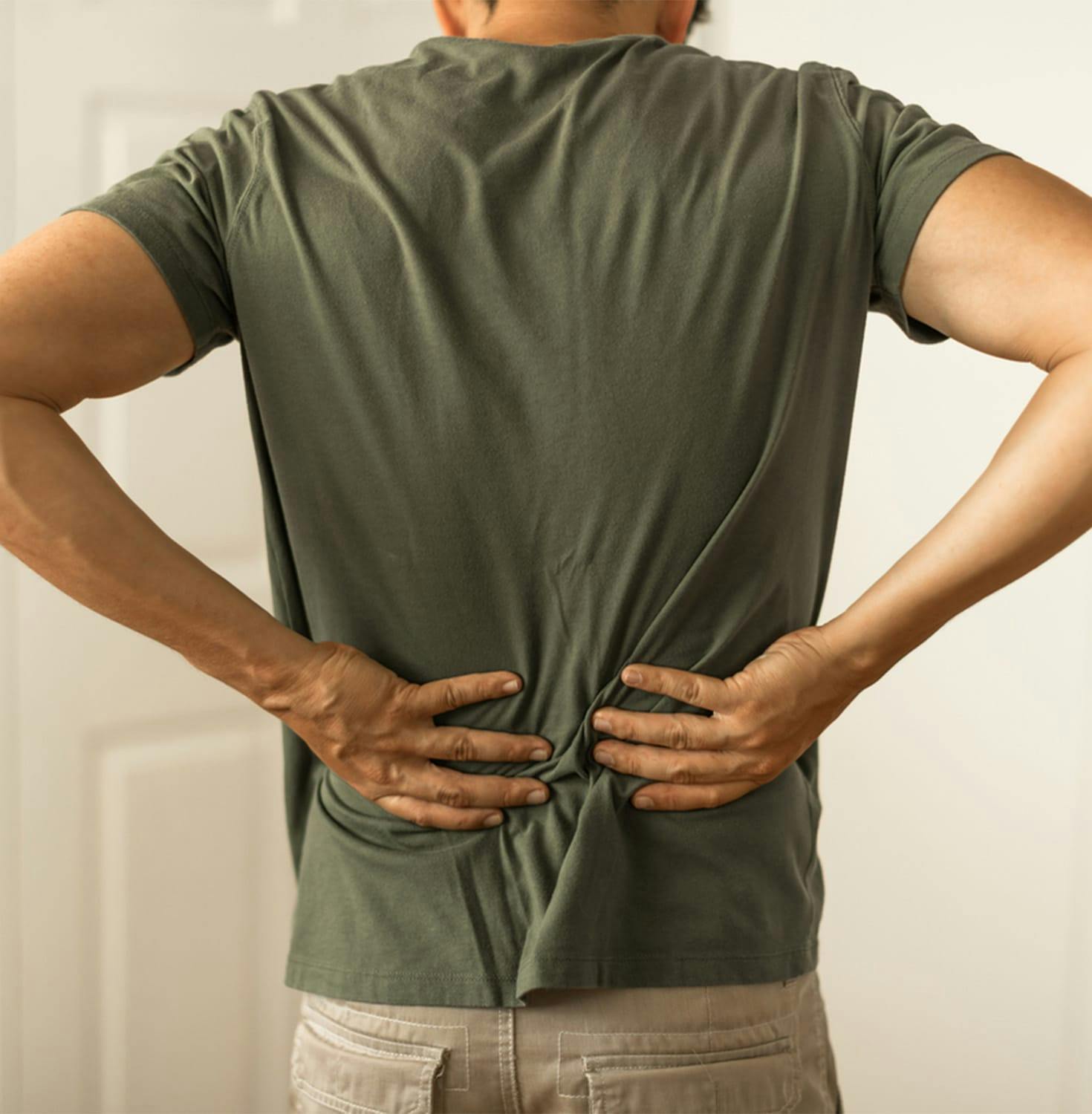 Dr. Rovner touching patients neck