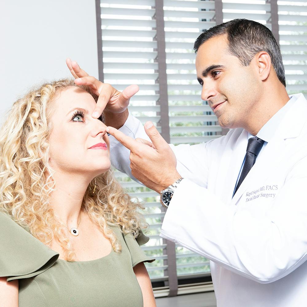 Dr. Saigal with a patient