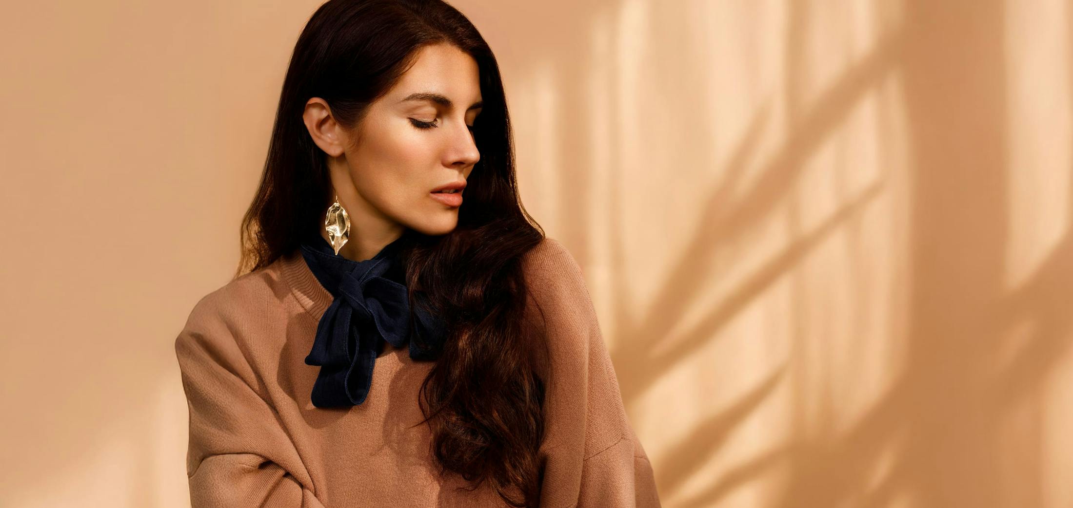 woman with long curly hair