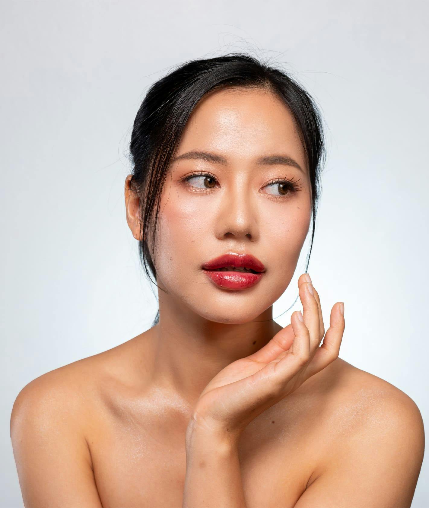 woman almost touching her jaw