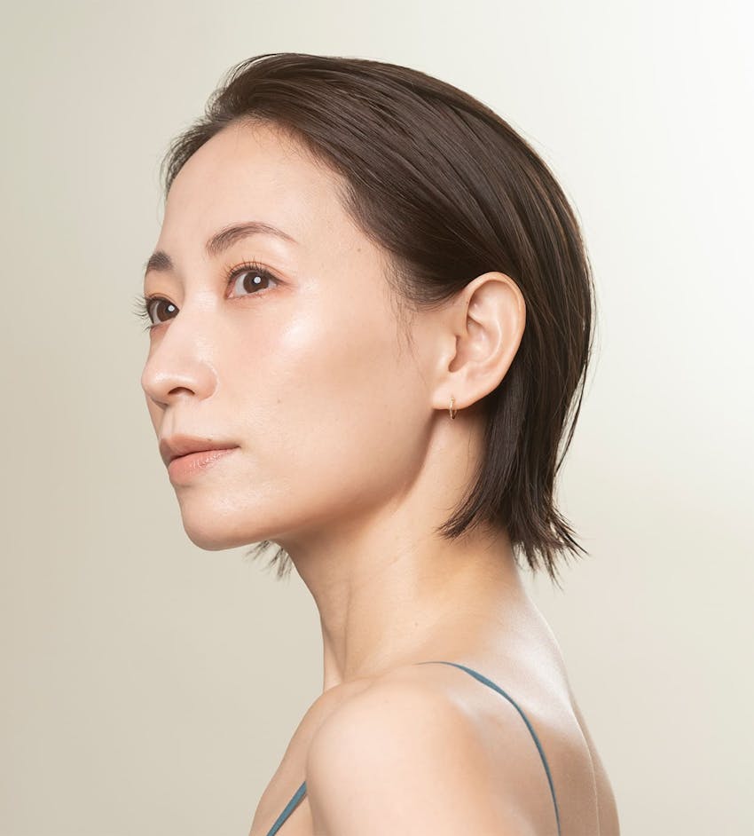 Woman with slicked hair