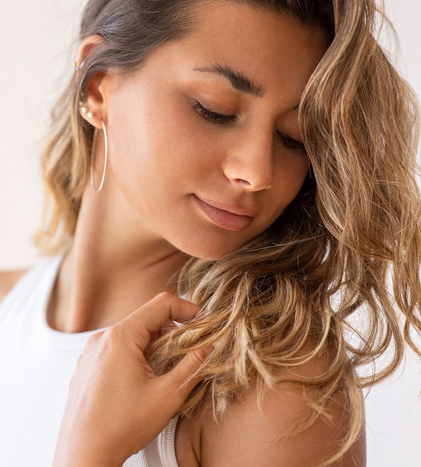 Woman looking at shoulder
