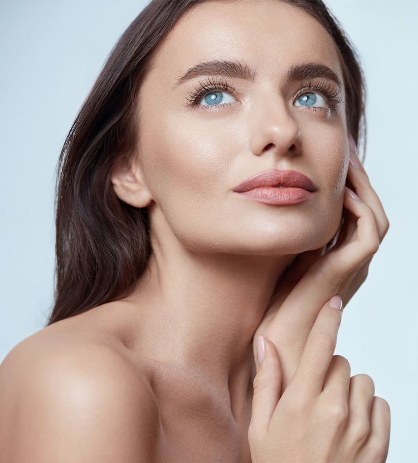 Woman looking upwards and smiling