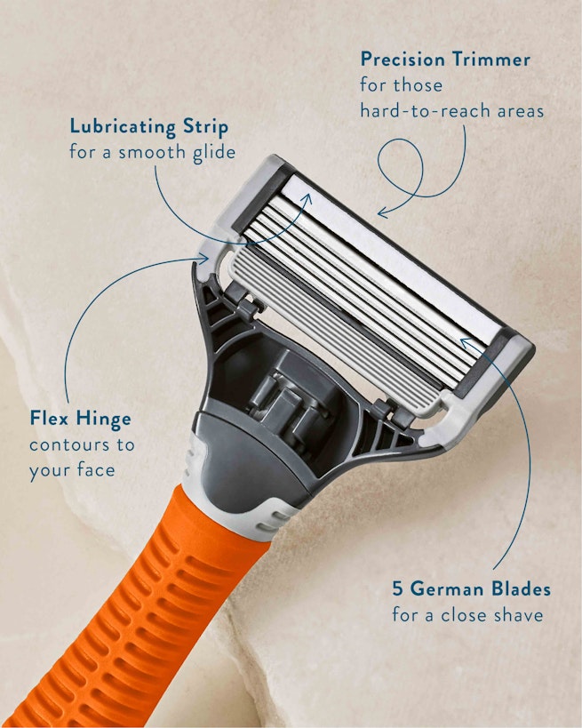 Harry's orange truman handle with close up razor blade showing upwards