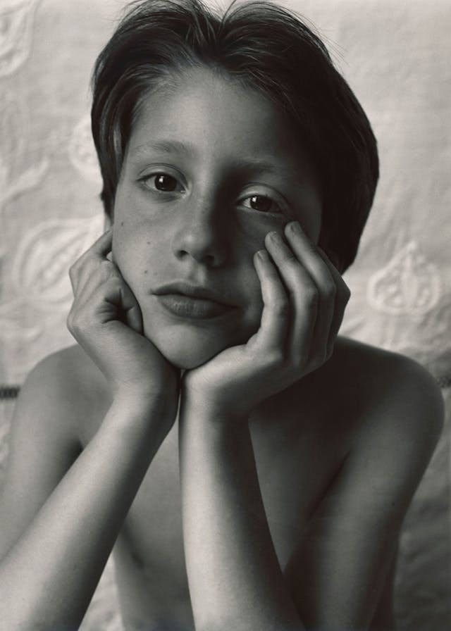 I was discovering when the light was good in certain spaces. I threw a Victorian tablecloth over a mobile wardrobe rail to create a background.