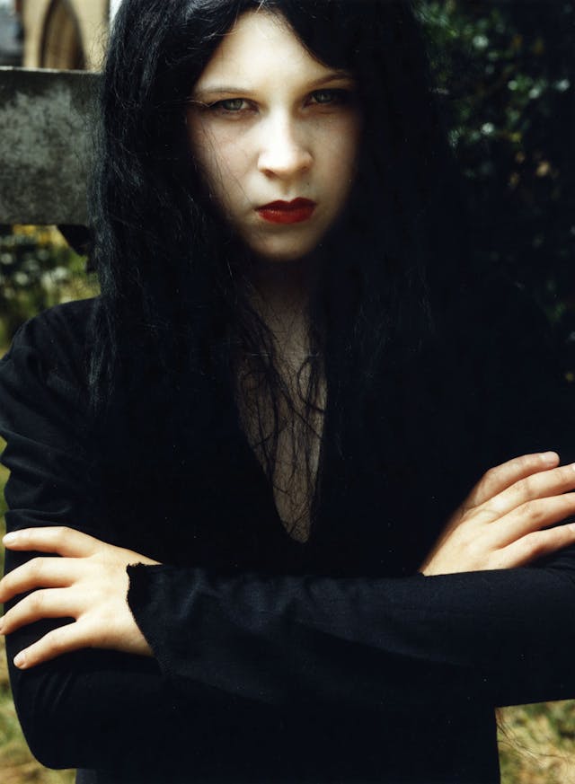 Part of the project involved a separate school Media Studies initiative where I asked all the girls how they wanted to be photographed if they could be anyone, anywhere. Sarah, 12, as Morticia, 1992, Entering the Masquerade 1992.
