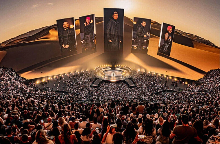 Backstreet Boys perform at Sphere Las Vegas wide angle shot includes audience and screen content IMAG in desertscape