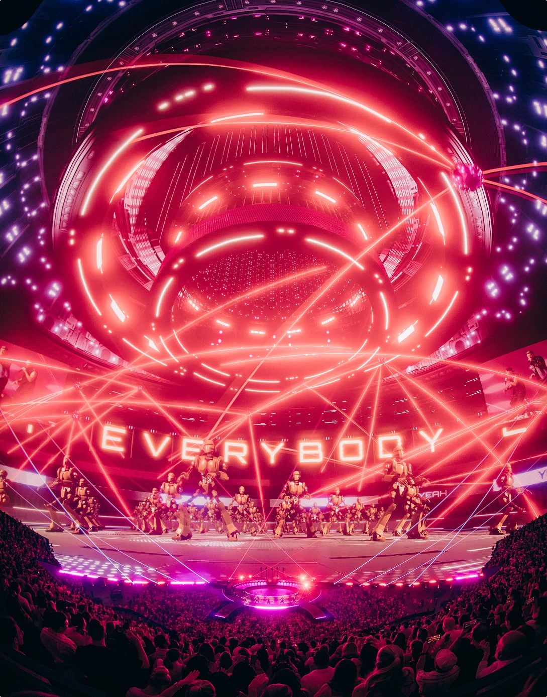 Backstreet Boys perform their hit song "Everybody (Backstreet's Back)" at Sphere Las Vegas.  Lasers and red lighting illuminate the stage