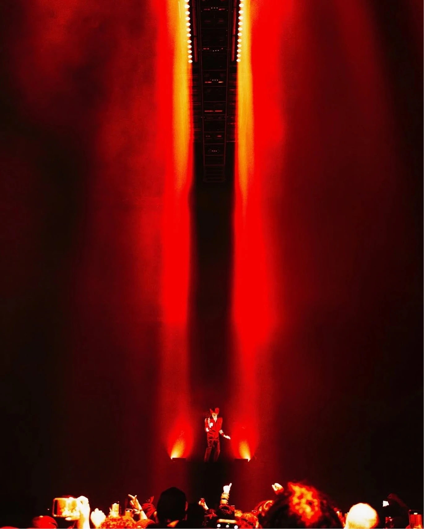 Tyler, The Creator - CHROMAKOPIA Tour - Silent House - Photo by Shaun Llewellyn Lighting design stage design wall of red light beams