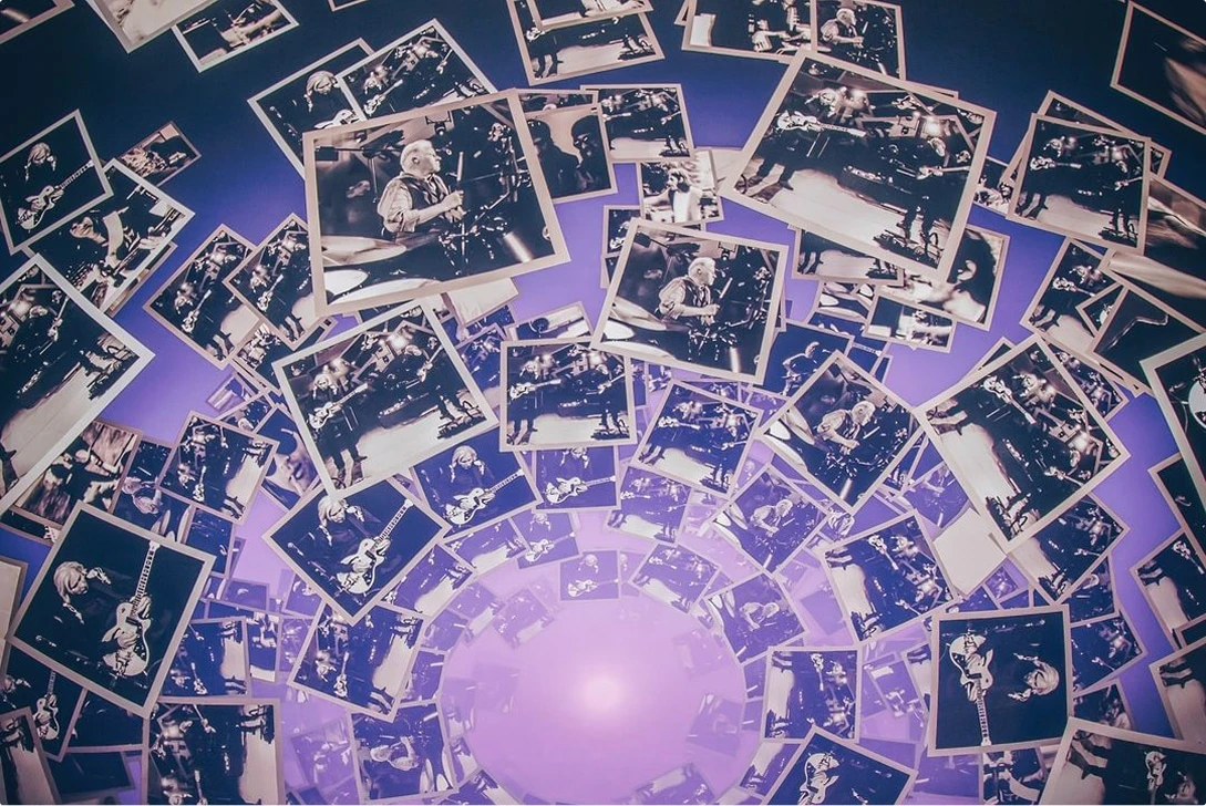 Polaroid vortex with purple lighting screen content at Sphere Las Vegas