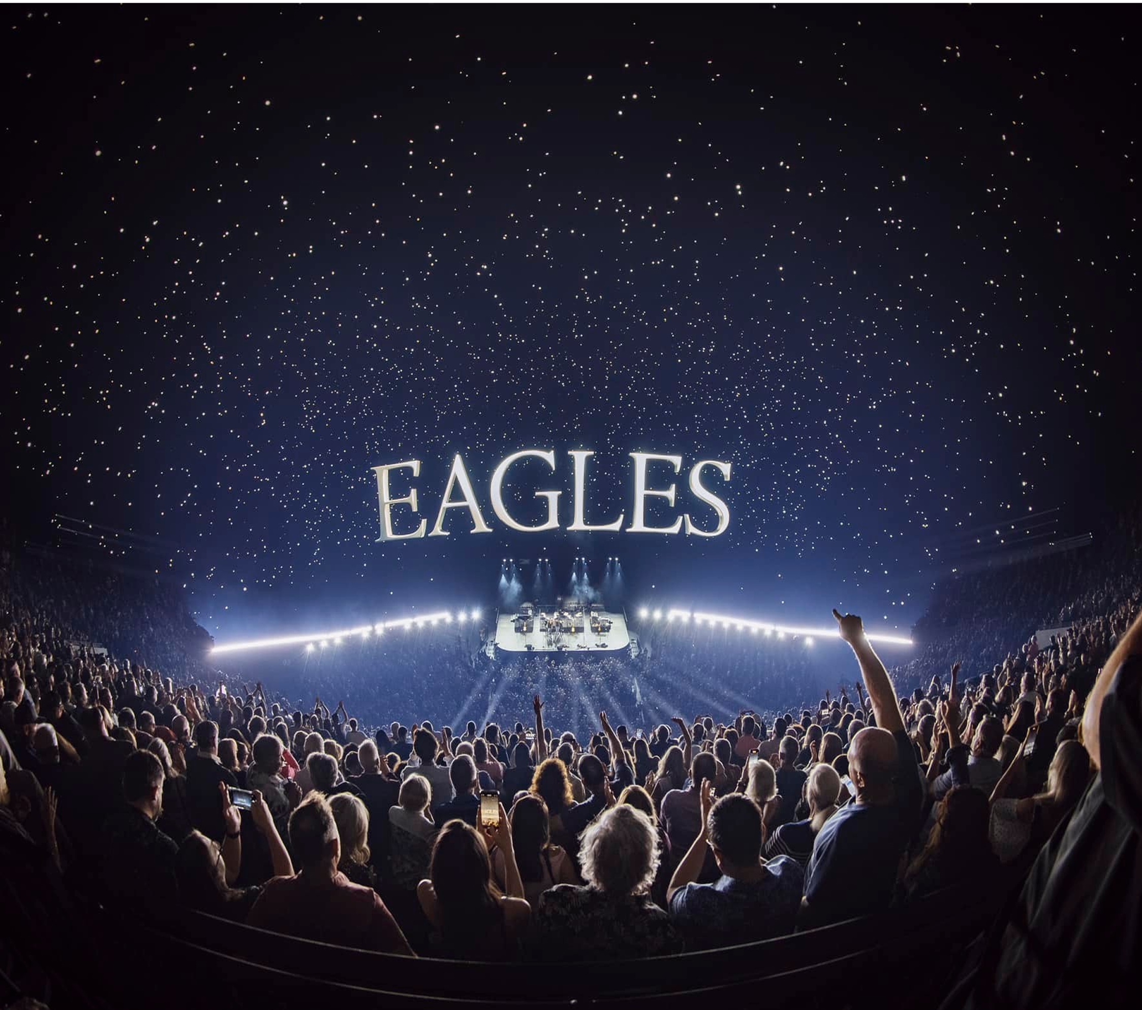 Wide angle lens of the audience and Eagles logo in starry sky video content at Sphere Las Vegas