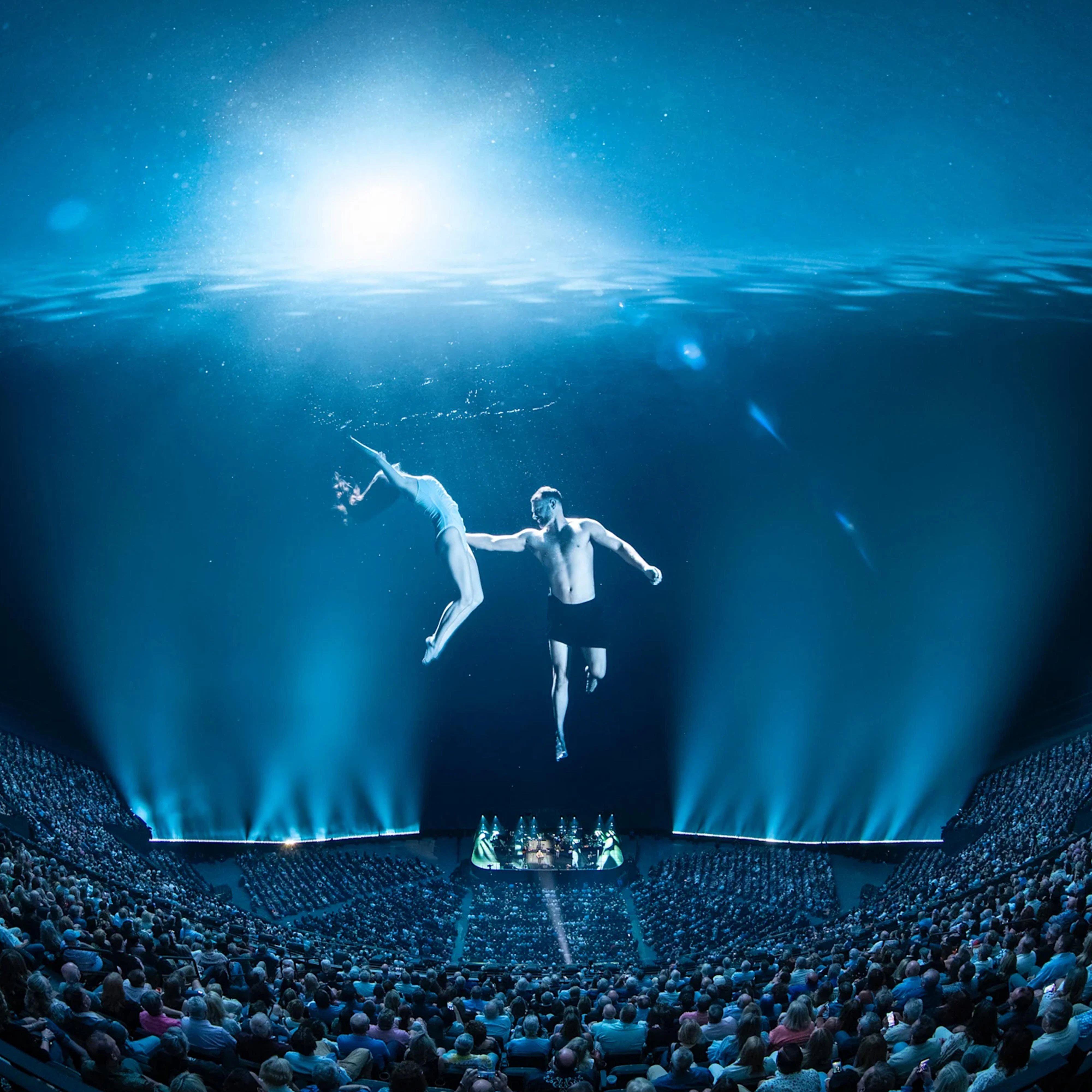 Eagles Sphere Las Vegas Residency Dancers underwater graceful pose content blue lighting at Sphere Las Vegas