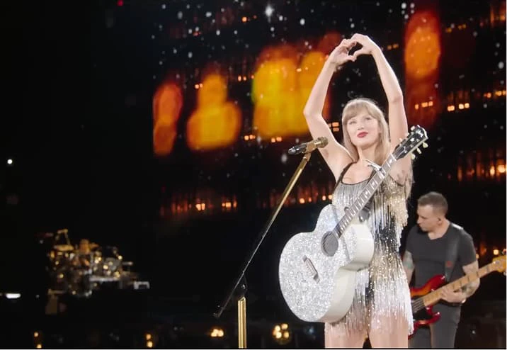 Taylor Swift performing on The Eras Tour