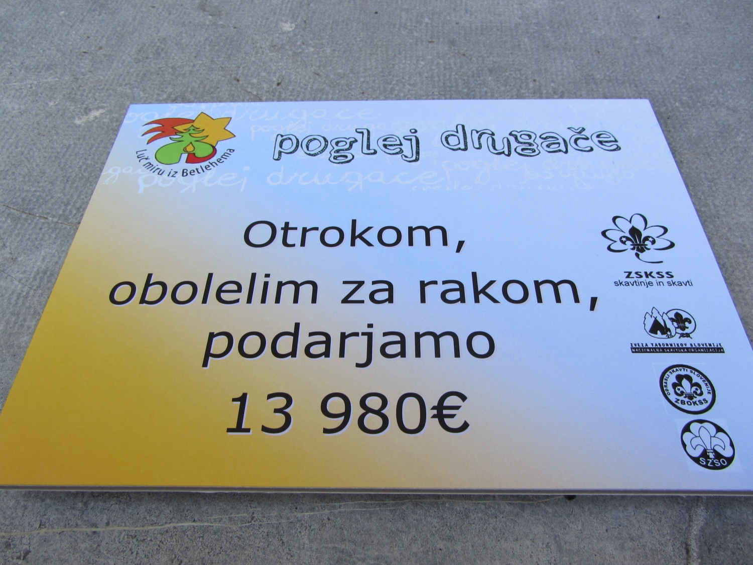 Luč miru iz Betlehema za pomoč otrokom z rakom