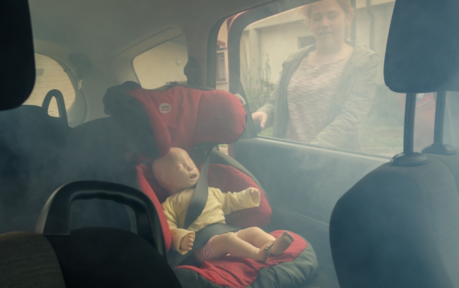 Otrok v gorečem avtomobilu