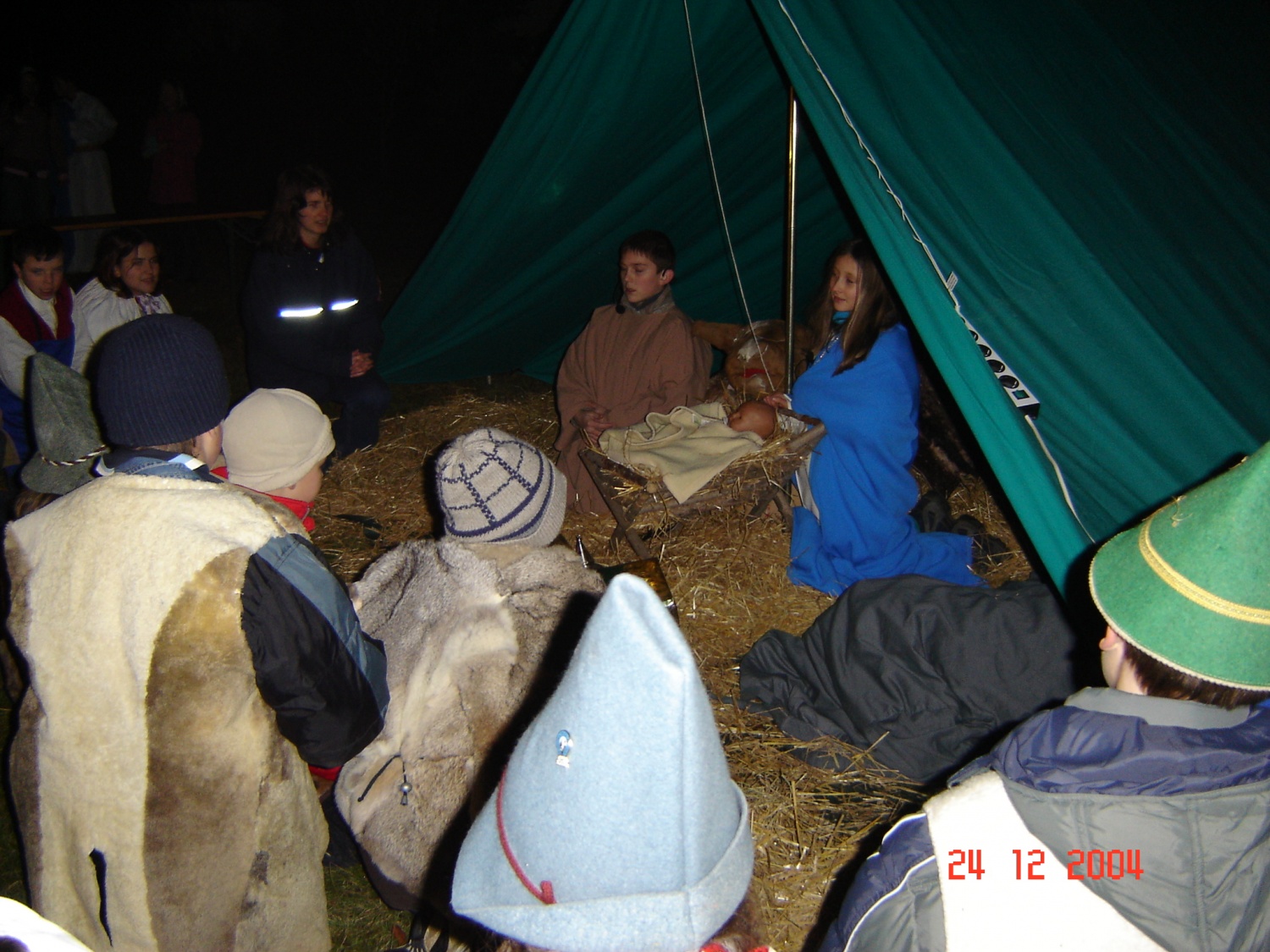 Poklonim se, vse izročim, k Jezusovim nogam...